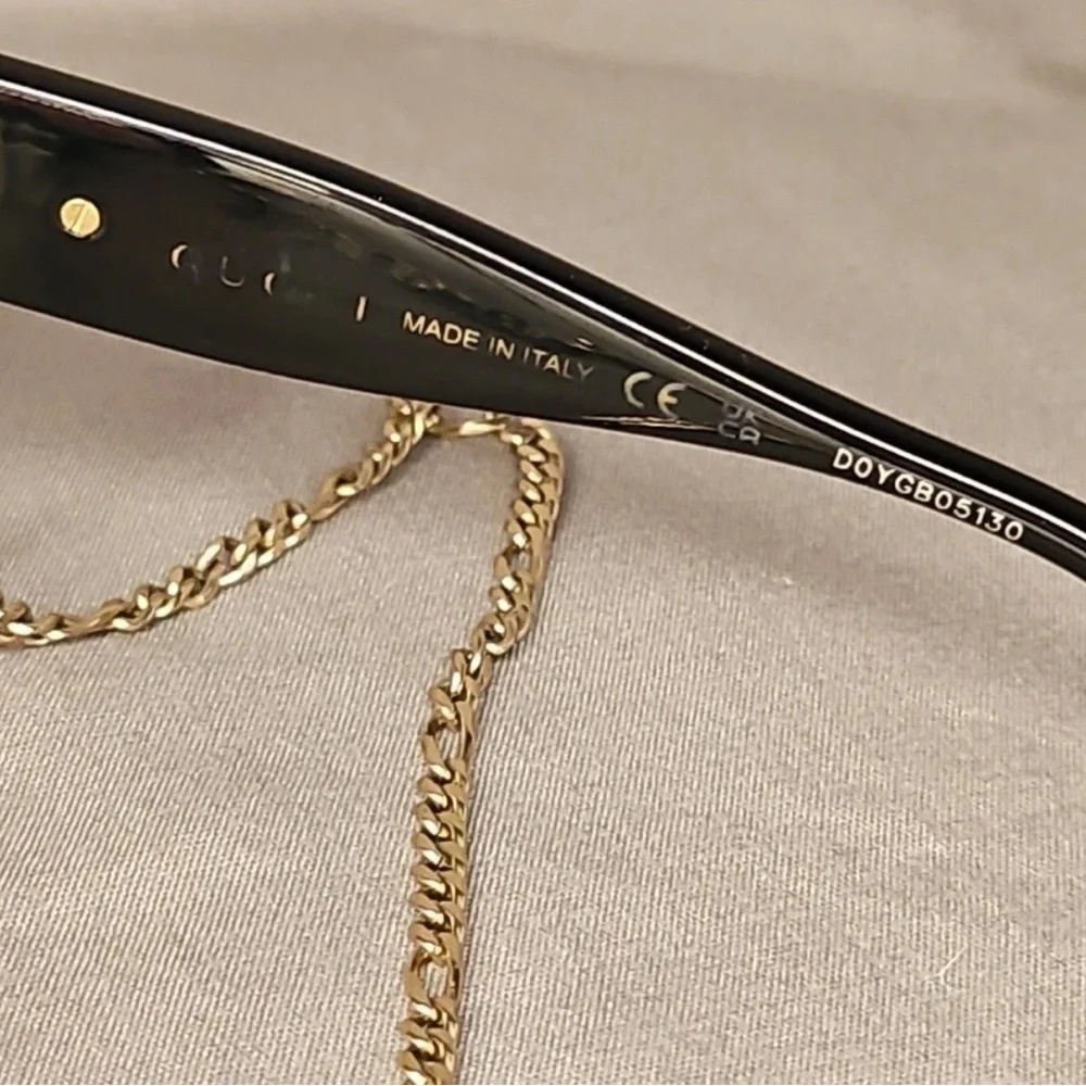 Gucci Black Sunglasses with Gold Chain Accent and case. Pre owned not new. - Picture 10 of 11